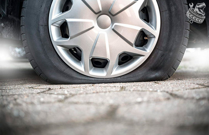 спущенное колесо